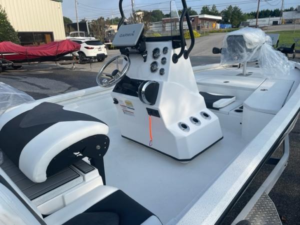 Slide: The Image of 2022 Vexus 1980 CC boat interior with Garmin navigation system and seating. - 7