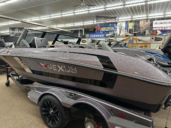 Slide: The Image of 2024 Vexus DVX19S boat in showroom, side view. - 0