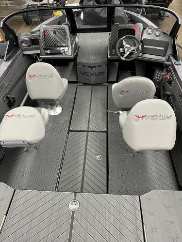 Slide: The Image of 2024 Vexus DVX19S boat interior with two seats and advanced dashboard. - 10