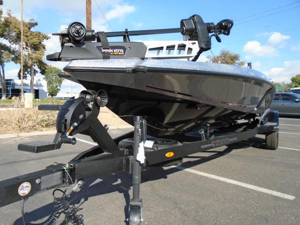 Slide: The Image of 2024 Vexus VX20 boat on trailer in parking lot. - 12