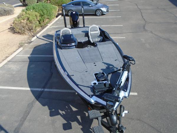 Slide: The Image of 2024 Vexus VX20 fishing boat parked in a lot. - 5