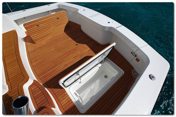 Slide: The Image of 2025 Viking 44 Open Express boat deck with storage compartment. - 14