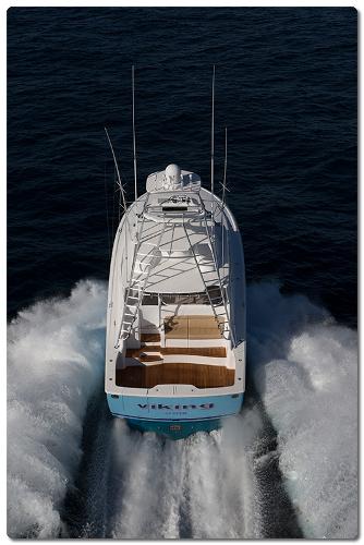 Slide: The Image of 2025 Viking 44 Open Express yacht cruising on open water. - 2