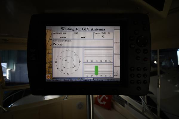 Slide: The Image of GPS display on a 1988 Viking 48 Convertible boat, showing signal status and navigation details. - 24