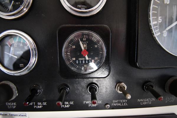 Slide: The Image of Dashboard controls of a 1988 Viking 48 Convertible boat. - 28