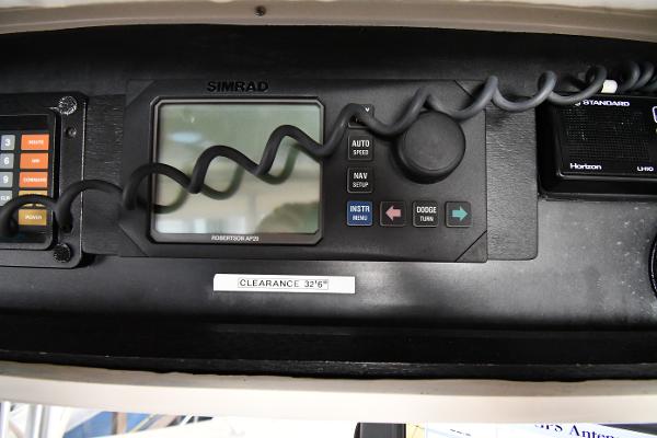 Slide: The Image of Control panel of 1988 Viking 48 Convertible boat with Simrad navigation system. - 30