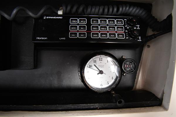 Slide: The Image of Standard Horizon radio and clock in 1988 Viking 48 Convertible boat. - 31