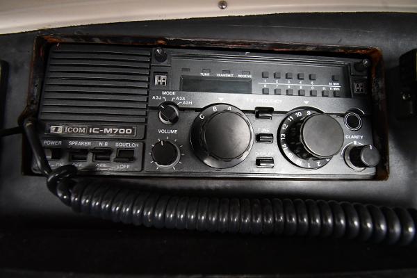 Slide: The Image of Icom IC-M700 radio on 1988 Viking 48 Convertible boat dashboard. - 33