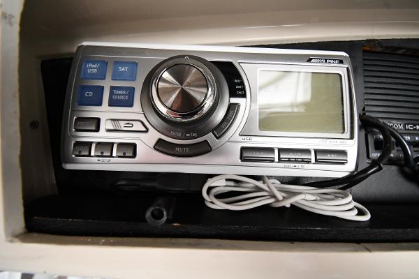 Slide: The Image of Stereo system on a 1988 Viking 48 Convertible boat dashboard. - 34