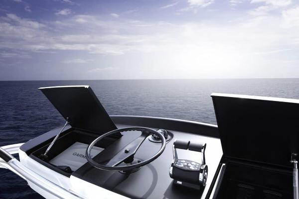 Slide: The Image of Control panel of 2025 Viking 58 Convertible yacht with ocean view. - 10