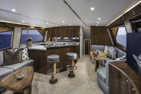 Slide: The Image of Luxurious interior of 2025 Viking 58 Convertible yacht with modern furnishings and ocean view. - 11