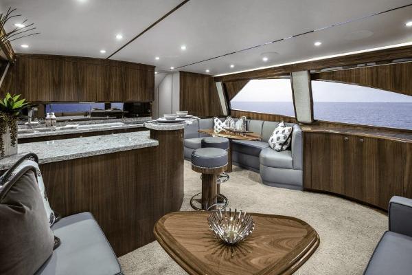 Slide: The Image of Luxurious interior of 2025 Viking 58 Convertible yacht with modern furnishings and ocean view. - 12