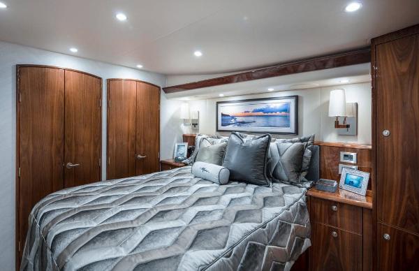 Slide: The Image of Luxurious bedroom in 2025 Viking 58 Convertible yacht with modern decor. - 14