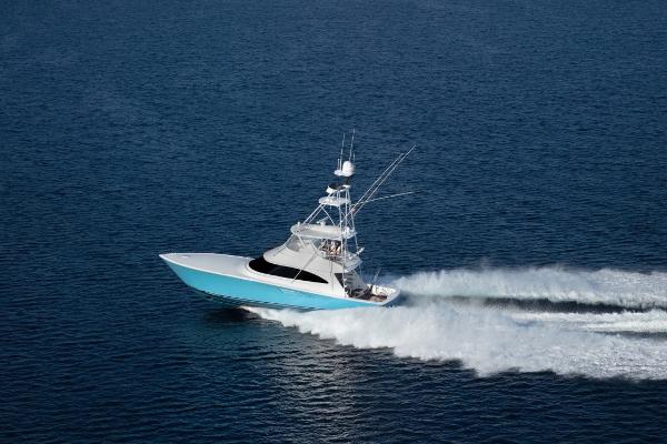 Slide: The Image of 2025 Viking 58 Convertible yacht cruising on open water. - 20