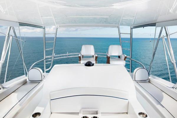 Slide: The Image of 2025 Viking 58 Convertible yacht helm overlooking the ocean - 5