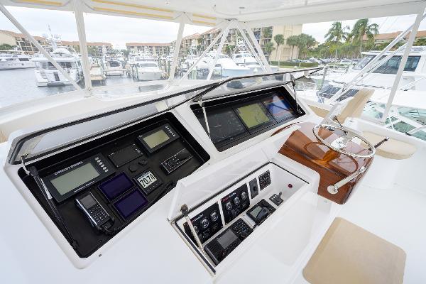 Slide: The Image of Viking 61 yacht helm station, 2005 model, featuring advanced navigation controls and luxurious seating. - 15