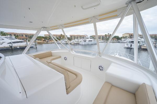 Slide: The Image of Luxurious interior of 2005 Viking 61 yacht with marina view. - 17
