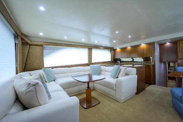 Slide: The Image of Luxurious interior of a 2005 Viking 61 yacht with plush seating and modern decor. - 33