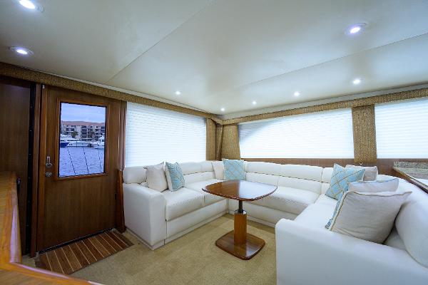 Slide: The Image of Luxurious interior of 2005 Viking 61 yacht with plush seating and elegant decor. - 34