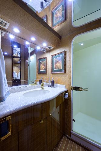 Slide: The Image of Luxurious bathroom in 2005 Viking 61 yacht with elegant decor and modern amenities. - 46