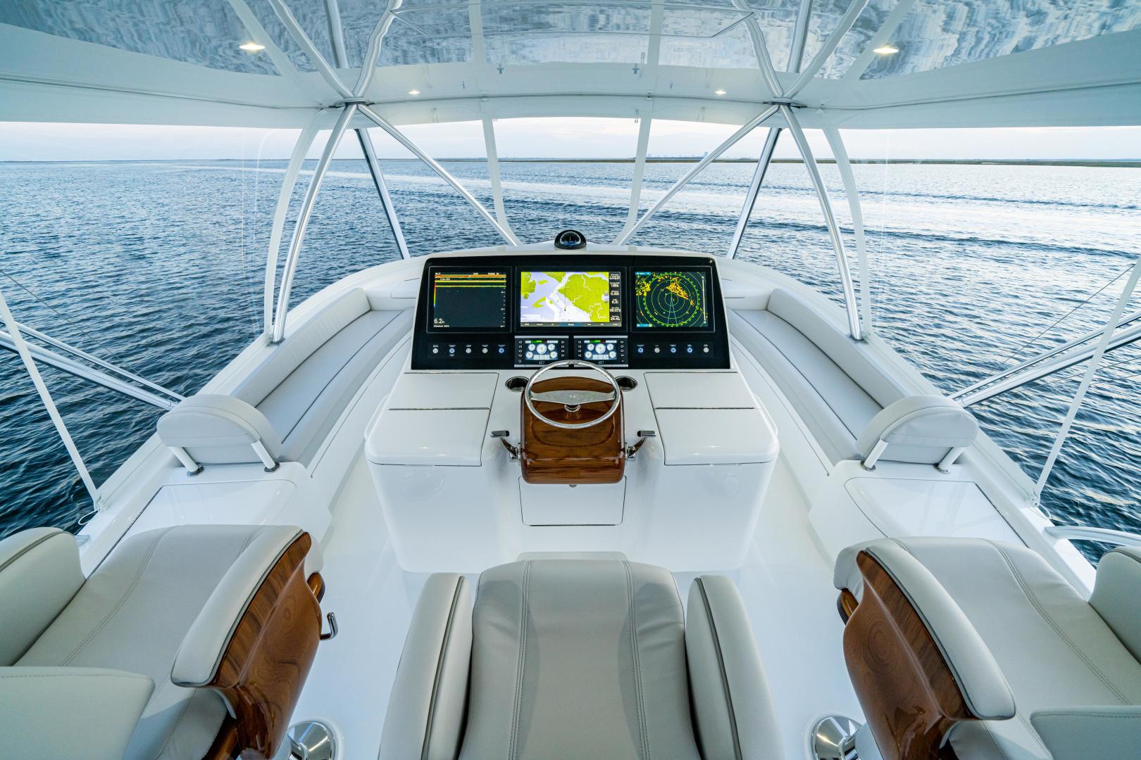 Slide: The Image of 64 Viking Convertible Flybridge Helm - 3694225