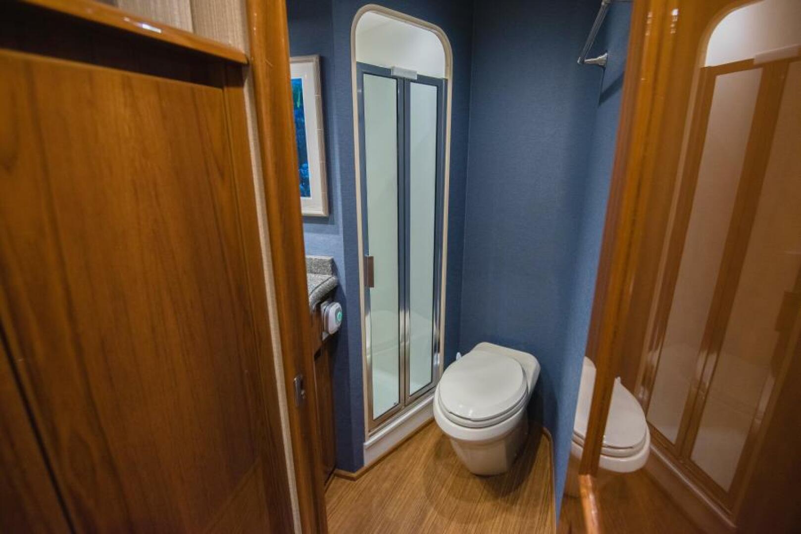 Slide: The Image of 2017 Viking 66 Convertible Starboard Stateroom Head - 4745919