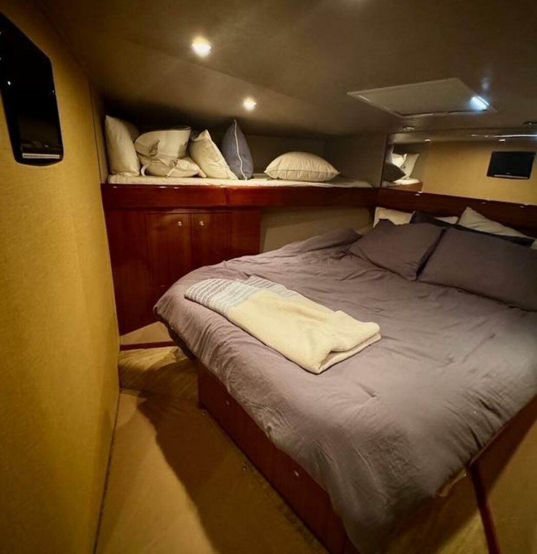 Slide: The Image of 2005 Viking 74 Convertible 'Liquid Gold' Forward Stateroom - 5427081