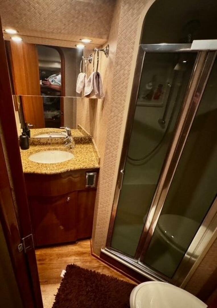 Slide: The Image of 2005 Viking 74 Convertible 'Liquid Gold' Crew Head - 5427089