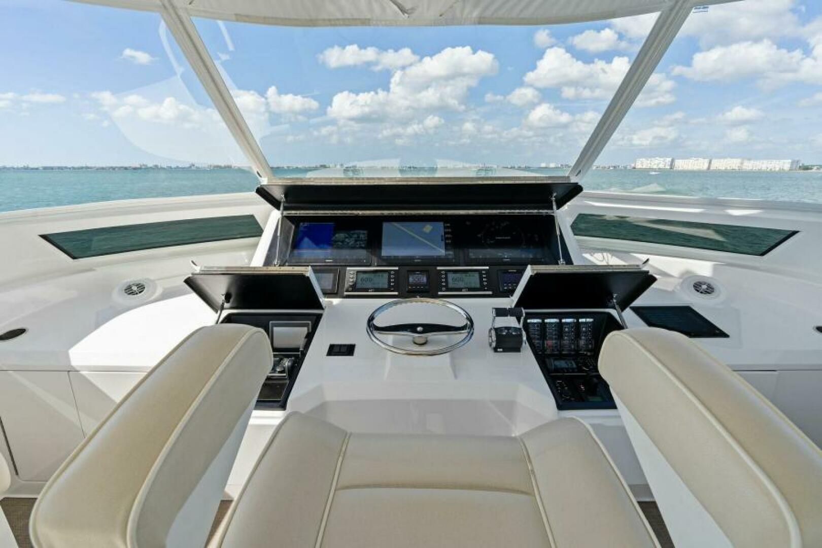 Slide: The Image of 2021 Viking 82 Cockpit Motor Yacht - MANA - Helm - 4866883