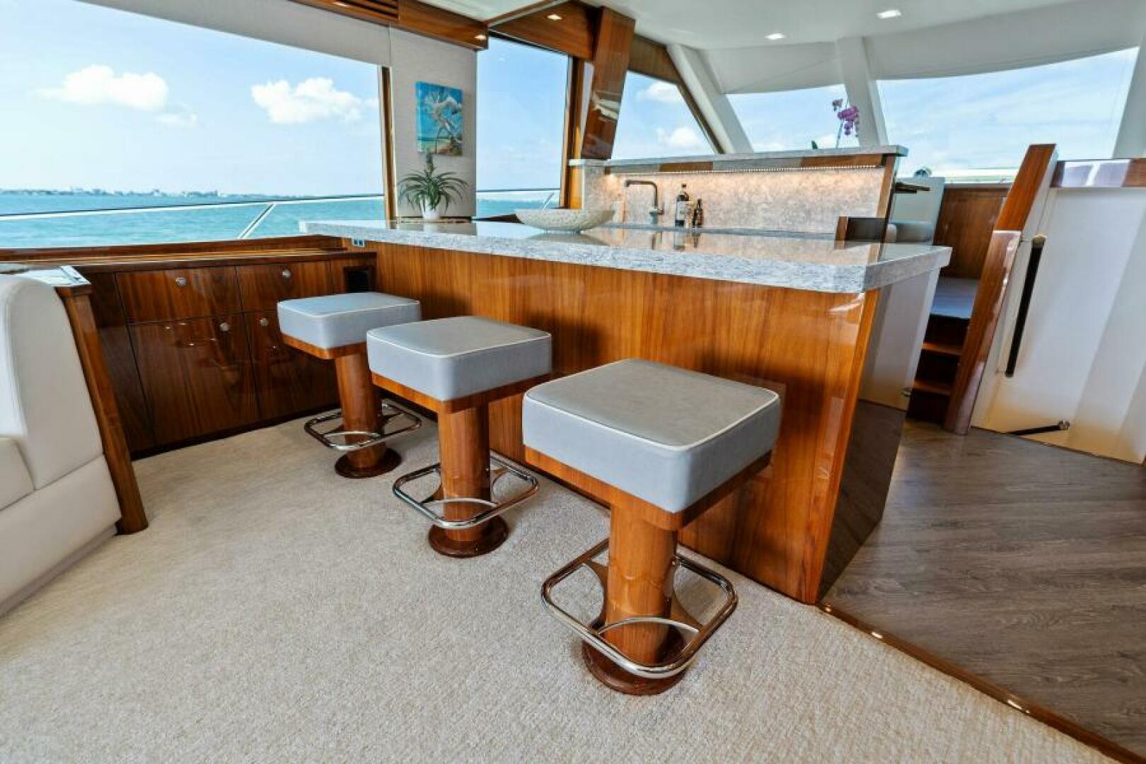 Slide: The Image of 2021 Viking 82 Cockpit Motor Yacht - MANA - Salon - 4866897