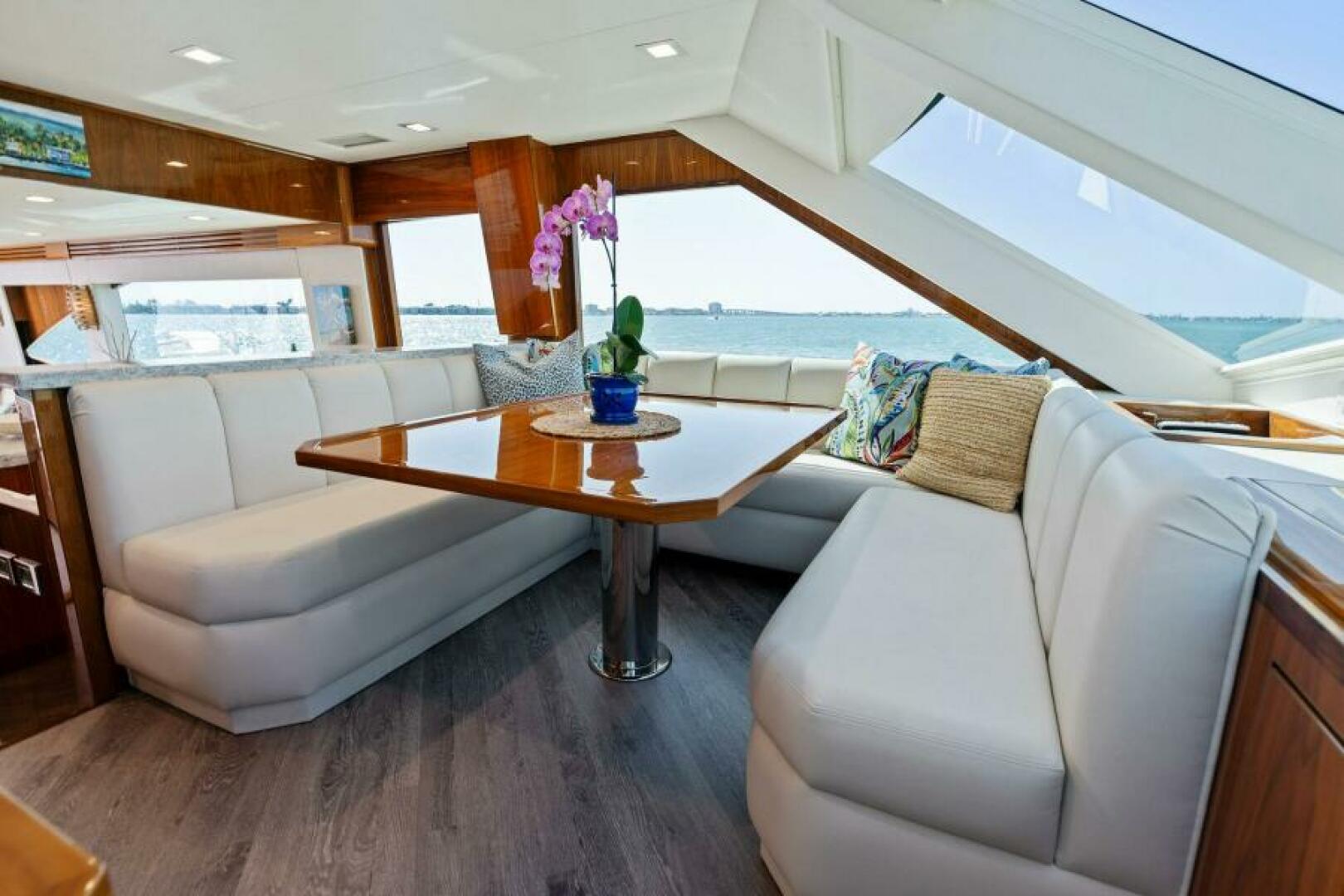 Slide: The Image of 2021 Viking 82 Cockpit Motor Yacht - MANA - Dinette - 4866905