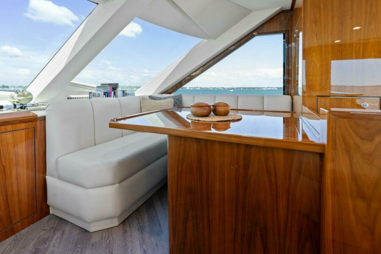 Slide: The Image of 2021 Viking 82 Cockpit Motor Yacht - MANA - Dinette - 4866909