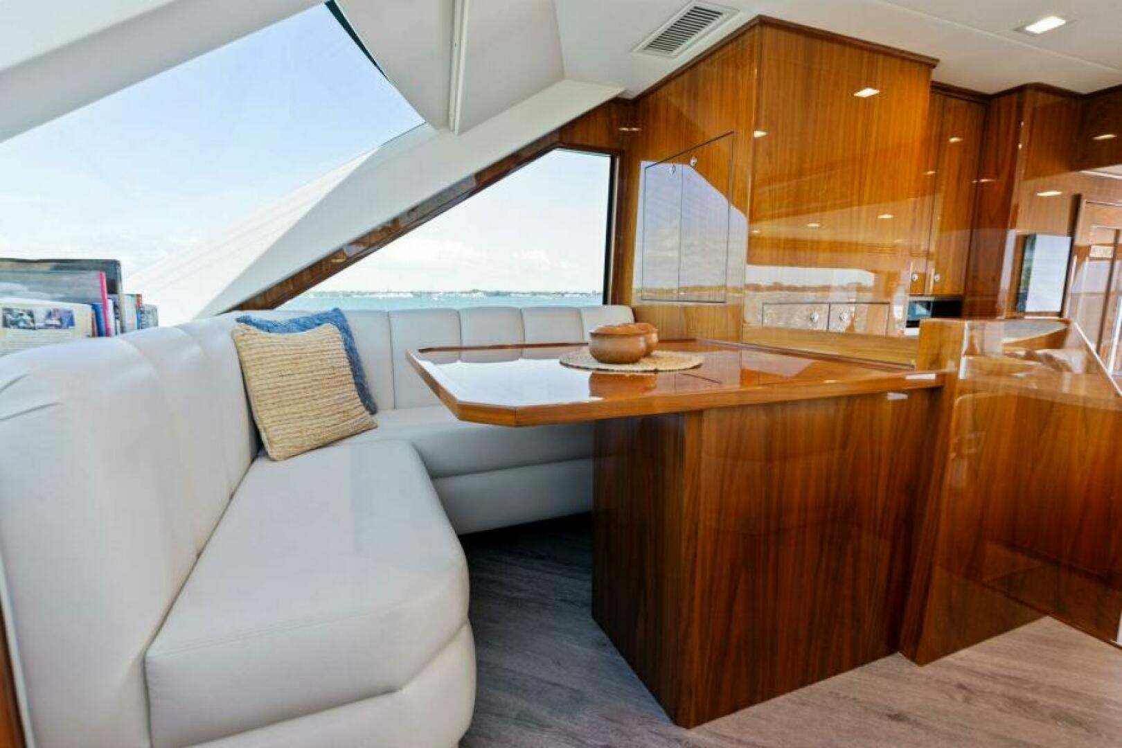 Slide: The Image of 2021 Viking 82 Cockpit Motor Yacht - MANA - Dinette - 4866910