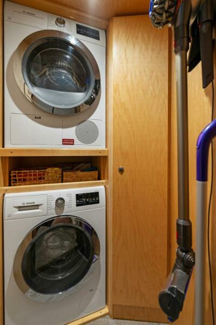 Slide: The Image of 2021 Viking 82 Cockpit Motor Yacht - MANA - Laundry - 4866940