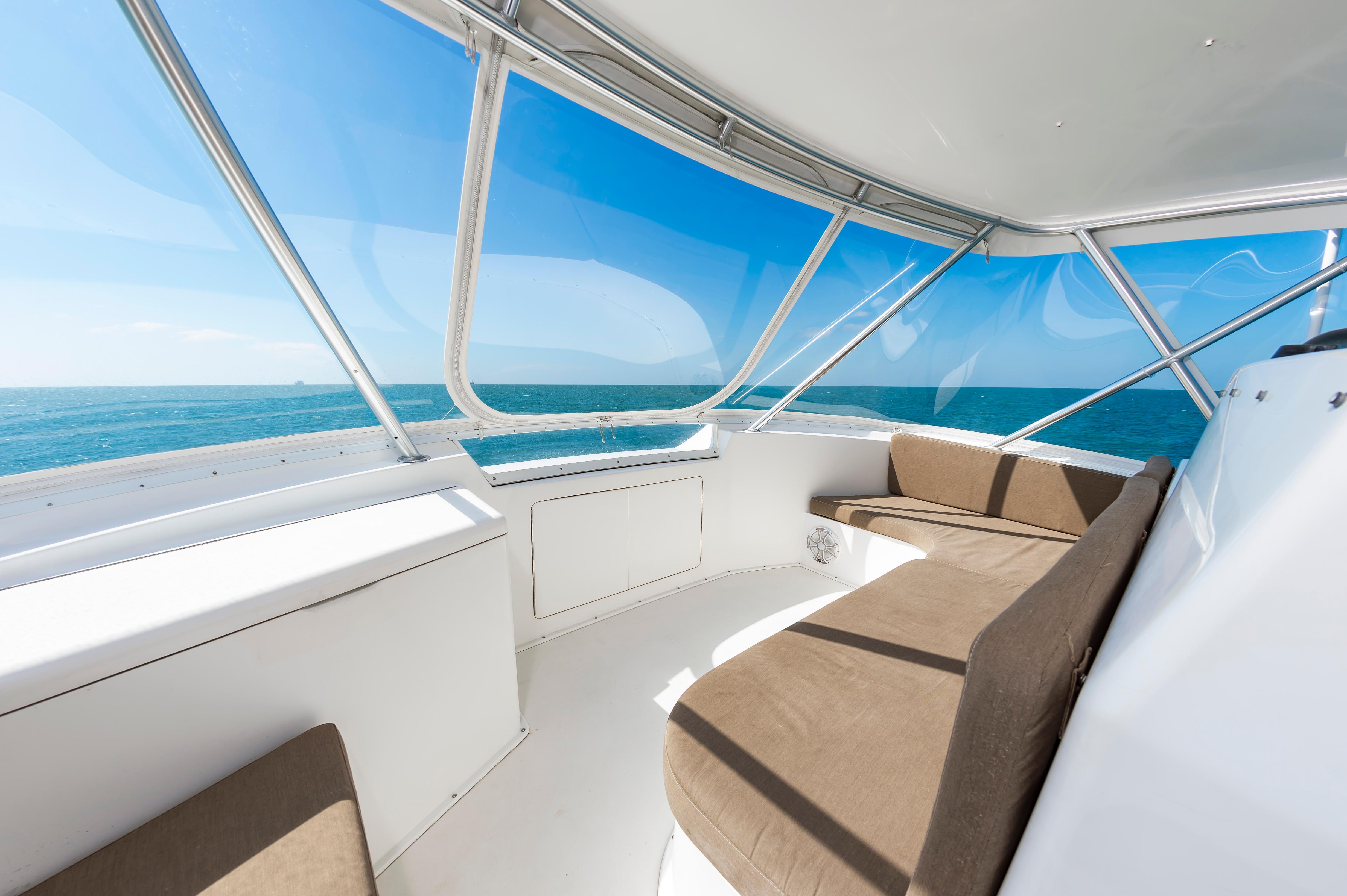 Slide: The Image of Interior view of 1998 Viking Convertible yacht with ocean backdrop. - 17