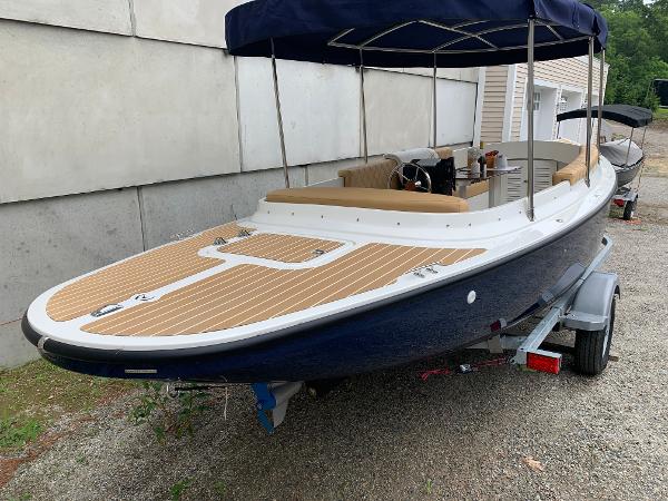 Slide: The Image of 2023 Vision Marine Technologies Fantail 217 electric boat on trailer. - 1