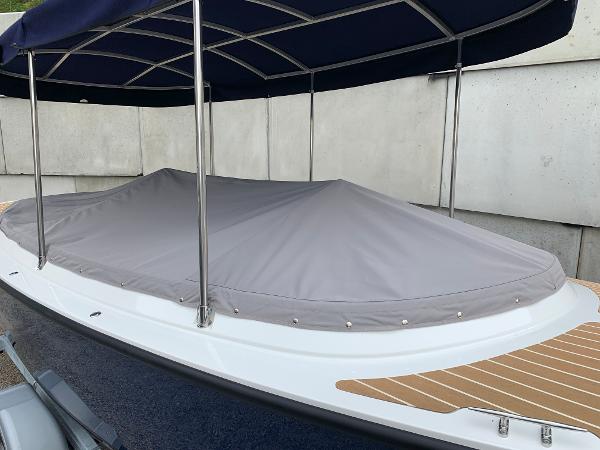 Slide: The Image of 2023 Vision Marine Technologies Fantail 217 boat with cover and canopy. - 12