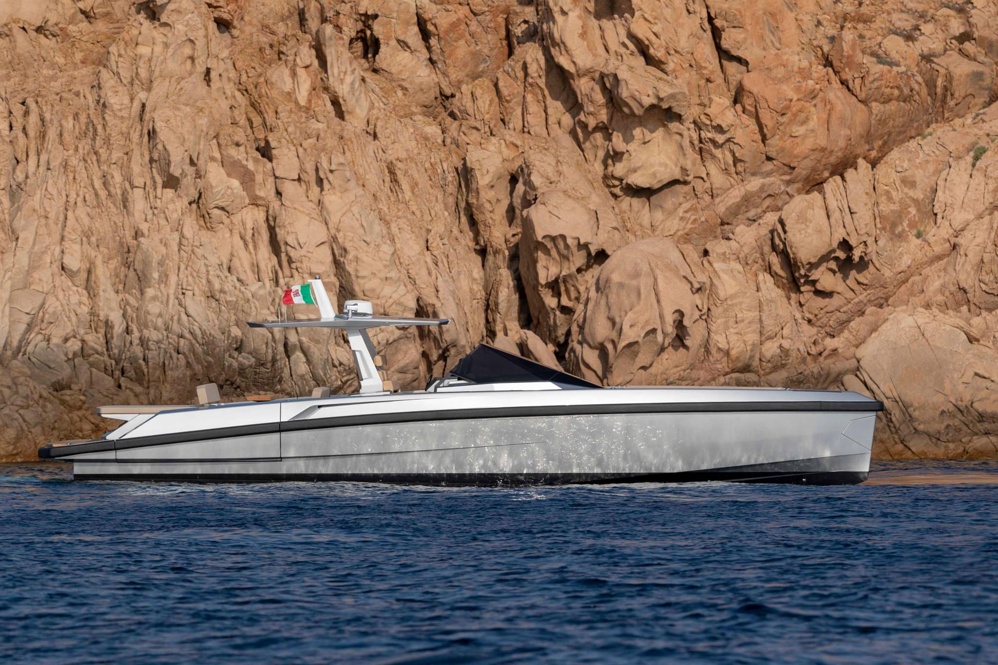 Slide: The Image of 2023 Wally WallyTender48 luxury yacht cruising near rocky coastline. - 4