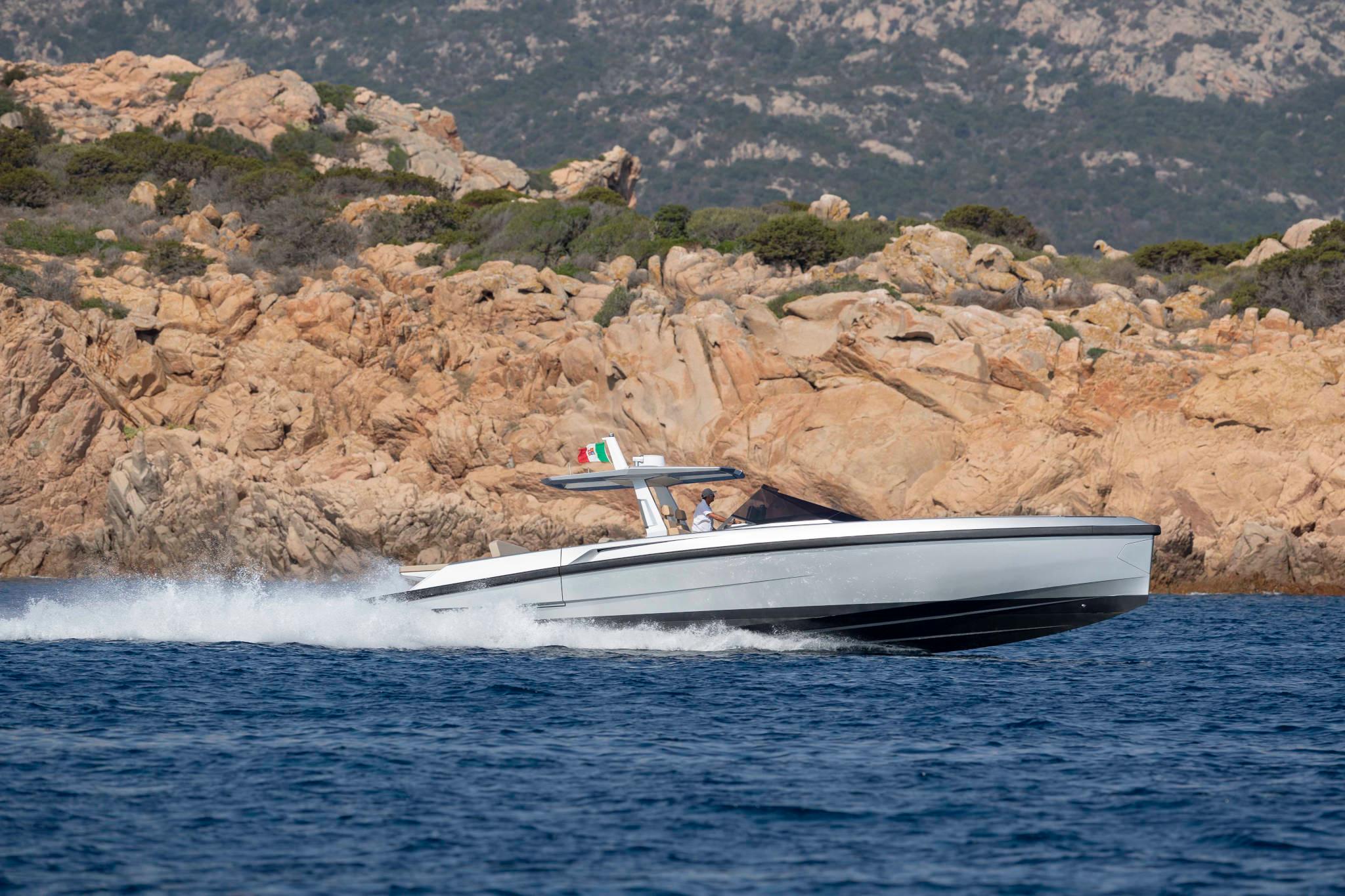 Slide: The Image of 2023 Wally WallyTender48 cruising near rocky coastline. - 6