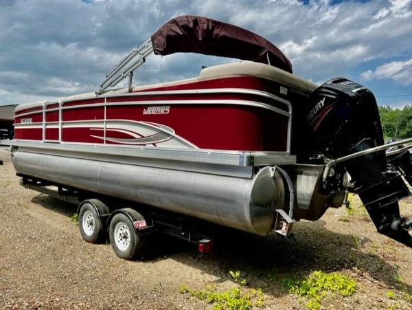 Slide: The Image of 2016 Weeres Pontoons ECLIPSE 240TT on trailer, red and silver, with Mercury outboard motor. - 1