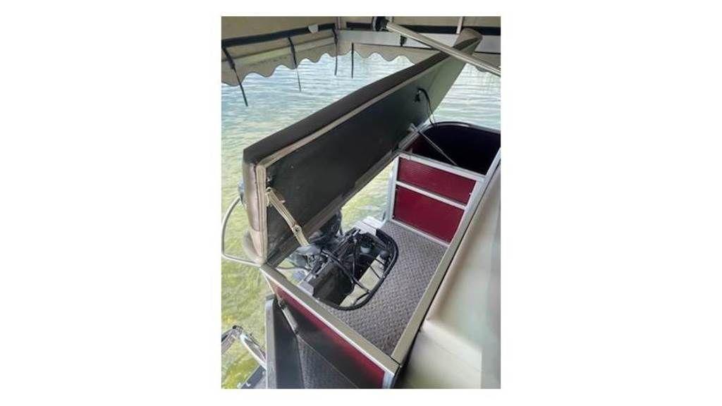 Slide: The Image of 2016 Weeres Pontoons ECLIPSE 240TT #19870 with open storage compartment. - 14
