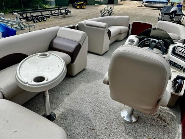 Slide: The Image of 2016 Weeres Pontoons ECLIPSE 240TT interior with beige seating and round table. - 7