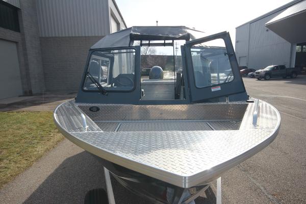 Slide: The Image of 2023 Weldcraft 210 Revolution F200XB boat in stock, front view. - 15