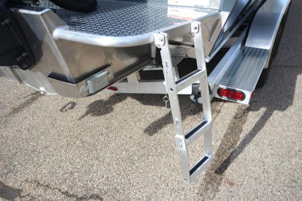 Slide: The Image of 2023 Weldcraft 210 Revolution F200XB boat ladder and trailer detail - 19