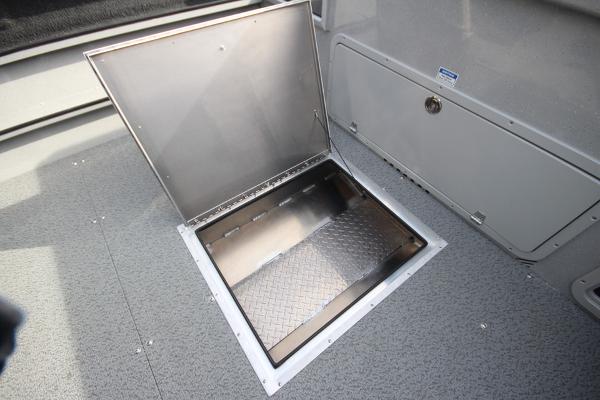 Slide: The Image of 2023 Weldcraft 210 Revolution F200XB boat storage compartment. - 24