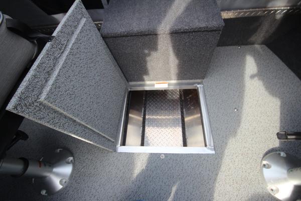 Slide: The Image of Open storage compartment in 2023 Weldcraft 210 Revolution F200XB boat. - 26