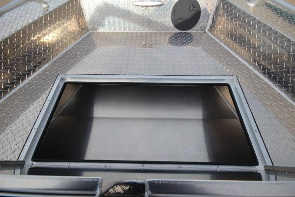 Slide: The Image of 2023 Weldcraft 210 Revolution F200XB boat storage compartment. - 30