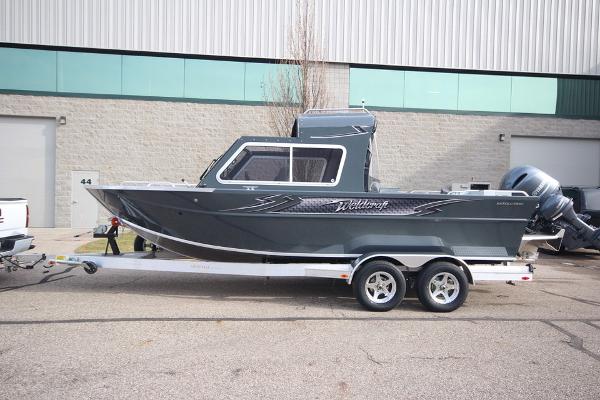 Slide: The Image of 2023 Weldcraft 210 Revolution F200XB boat on trailer, in stock. - 33