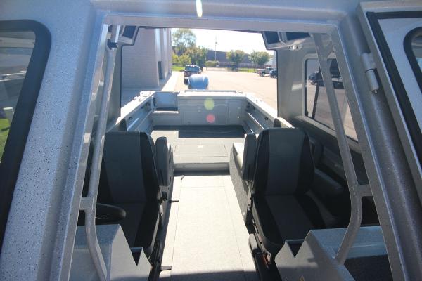 Slide: The Image of 2026 Weldcraft 220 Ocean King 250XB interior with seating and open deck view. - 32