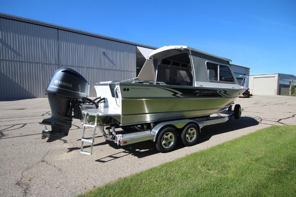 Slide: The Image of 2026 Weldcraft 220 Ocean King 250XB boat on trailer, parked outdoors. - 5